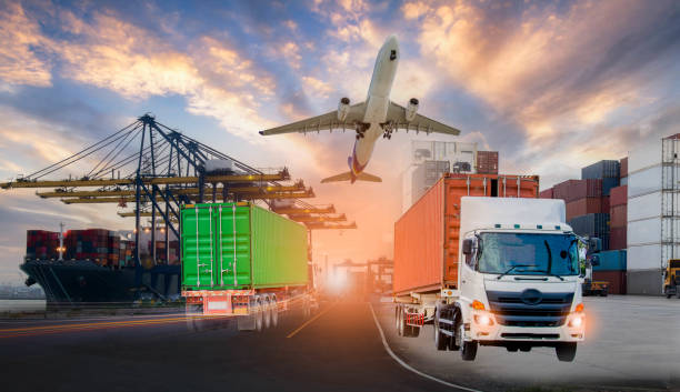 istock Logistics and transportation of Container Cargo ship and Cargo plane with working crane bridge in shipyard at sunrise, logistic import export and transport industry background 1324033112