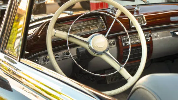 Photo of Steering wheel of a open vintage convertible car