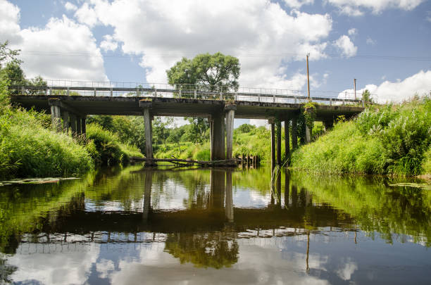 istock Concrete bridge over the river Ciecere, Latvia 1324034911