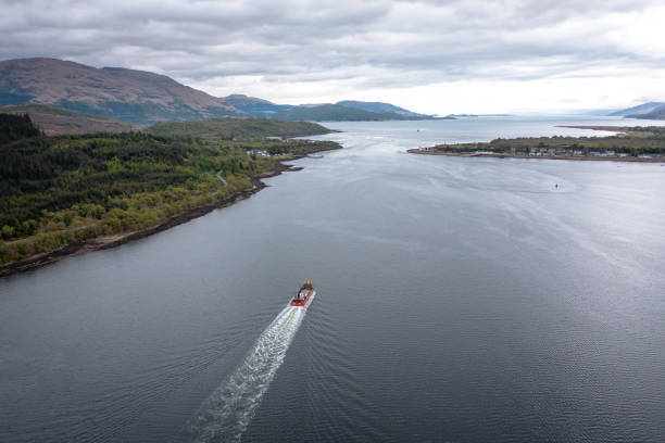 istock A Transporter Ship Motoring Next to the Coast 1324039556