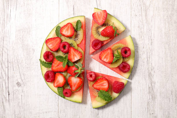 istock watermelon and berries fruits slices 1324042520