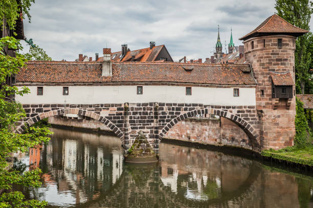 Old bridge over Pegnitz river in the Old town of Nuremberg, Germany