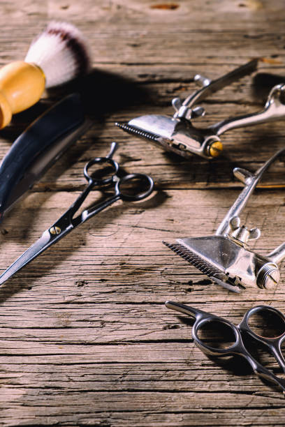 istock old barber tools on rustic wooden weathered background 1324051174