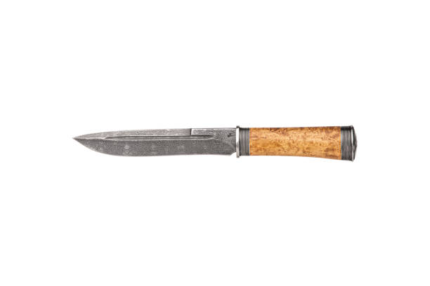 istock Hunting knife with wooden handle. Isolated on white background. 1324052620