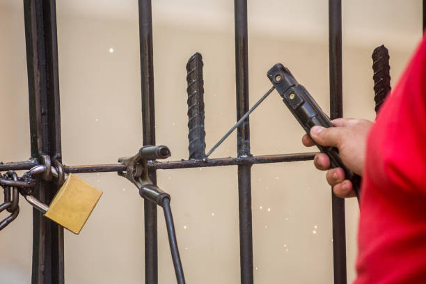 istock man using welding a piece of iron in an outdoor gate 1324054582
