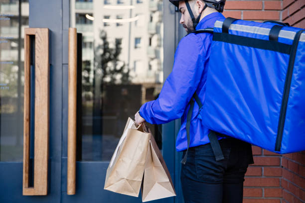 istock Food delivery man 1324061705