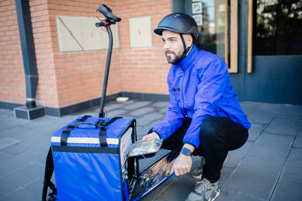 istock Food delivery man 1324061751