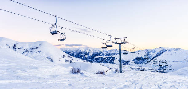 istock Aerial tramway in a ski resort 1324063590