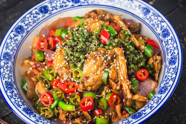 istock Stir-fried bullfrog with green and red peppers 1324063847