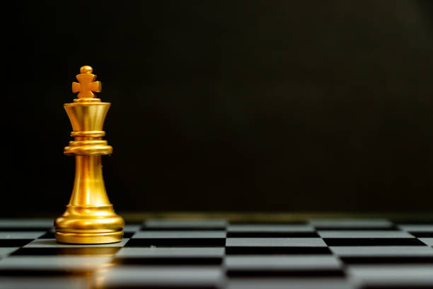 istock Gold king chess piece stand on black background with copy space (Concept for leadership, unique) 1324064428