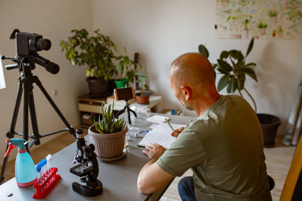 istock Mature man recording educational lesson for home classrooms 1324066560