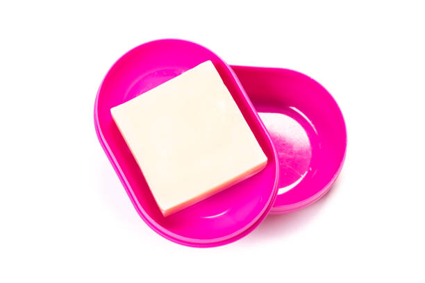 istock Soap in PLASTIC COLORED soap dish isolated on white background 1324067636