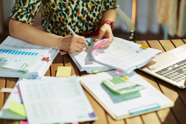 istock Modern accountant woman working with documents in office 1324067959