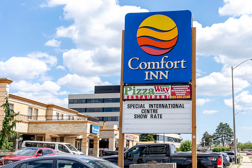 Mississauga, Ontario, Canada - August 11, 2019: Sign and logo of Comfort Inn near Pearson Airport in Mississauga, Ontario, Canada. Comfort Inn is a subdivision of American Choice Hotels International.