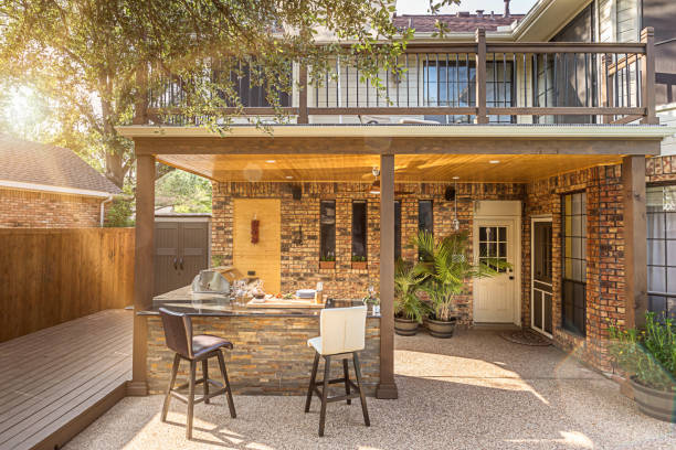 istock New and modern outdoor kitchen on a sunny summer evening, dinner preparation 1324069590
