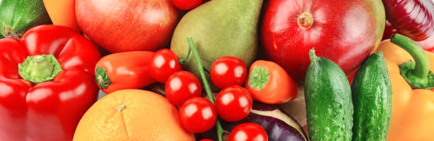 istock Beautiful bright background from various vegetables and fruits. 1324072478