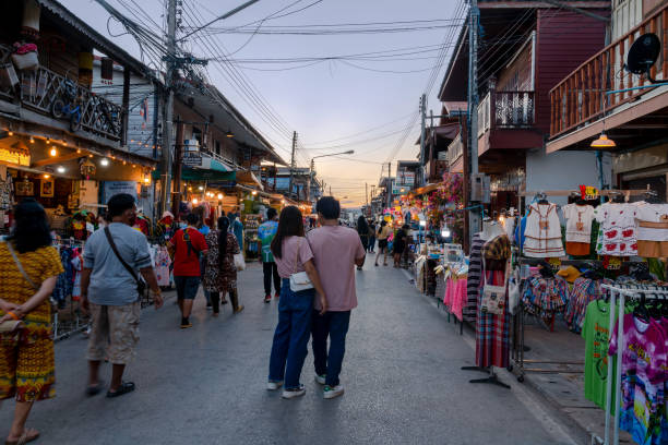 many tourist at chiang khan night market walking street in late evening in ancient community local travel - chiang khong imagens e fotografias de stock