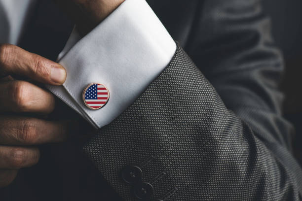 American Businessman Man in white shirt wearing cufflinks. US flag on cufflinks. cufflink stock pictures, royalty-free photos & images