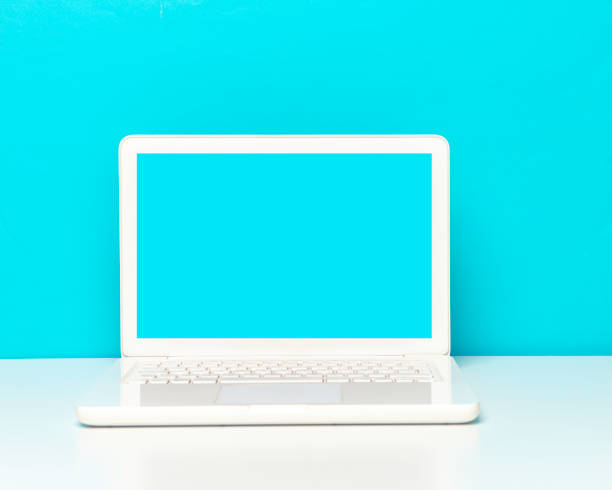 istock Blue Screen Laptop On The Office Desk 1324077926