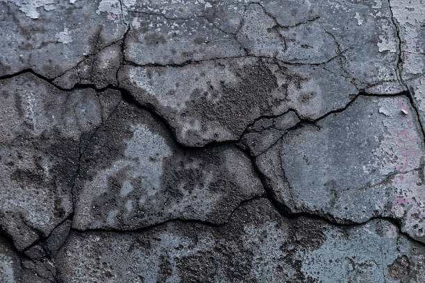 istock Cracked wall texture cement concrete floor background 1324080326
