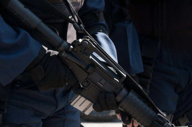 istock Soldier holding a machine with automatic gun.Preparation for military action 1324081548