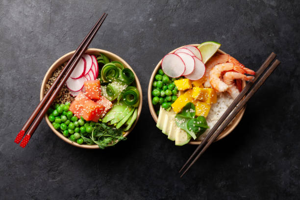 istock Poke bowls with shrimps, salmon, avocado and mango 1324089491