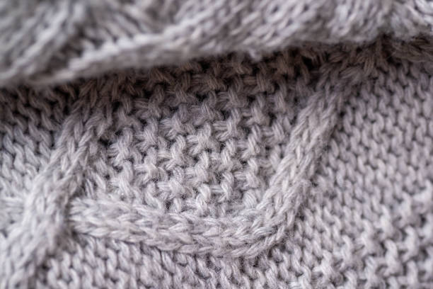 istock Fragment of a knitted woolen plaid close-up. 1324095261