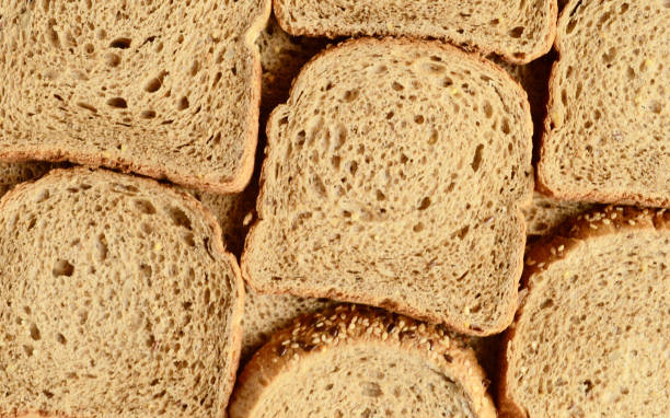 istock Bread background of sliced cereal bread 1324097566