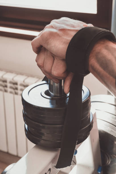 istock Muscular man during workout in the gym 1324099824