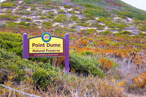 Malibu - California, USA - June 1st 2021: The Point Dume Natural Preserve sign in Malibu, California.
