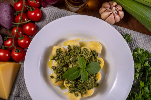istock Potato gnocchi with pesto sauce 1324104729