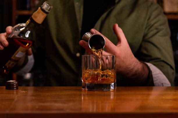 istock Making cocktail of whiskey 1324111460
