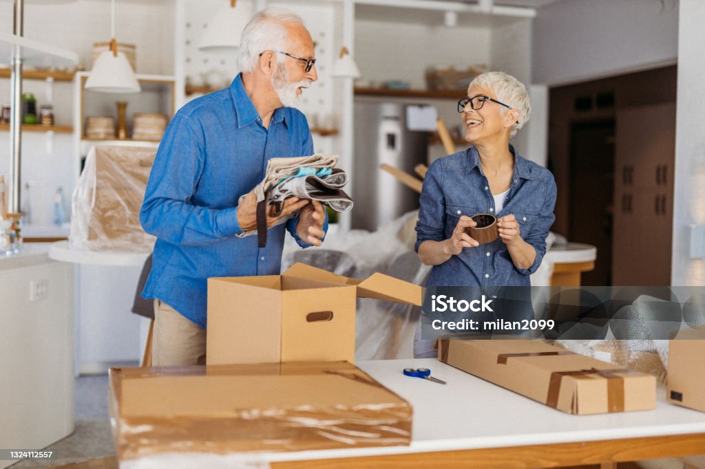 Senior couple moving Senior couple moving to a new home Relocation Stock Photo