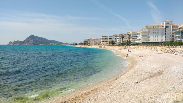 istock Cap Negret beach in Altea village on a sunny day 1324113401