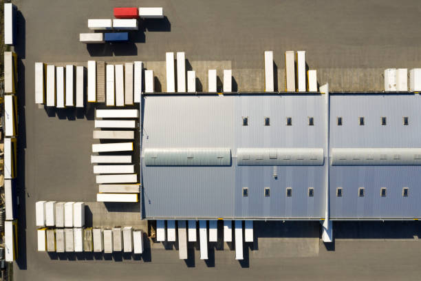 istock Aerial View of Cargo Containers and Distribution Warehouse 1324116152