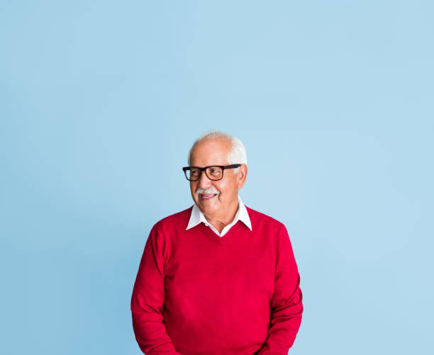 istock Senior man with eyeglasses looking away 1324116292