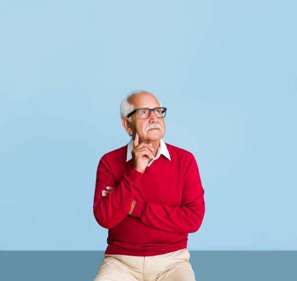 istock Senior latin man touching face and thinking away 1324116338