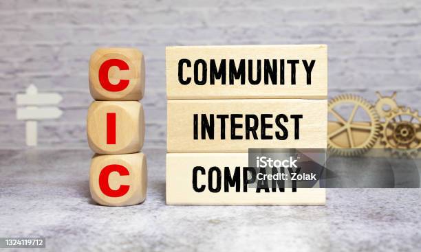 Community Interest Company Cic On Wooden Block Stock Photo - Download Image Now - Applying, Business, Color Image