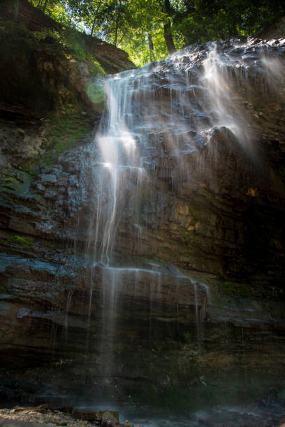 istock Waterfall Glistens in the Sun 1324119820