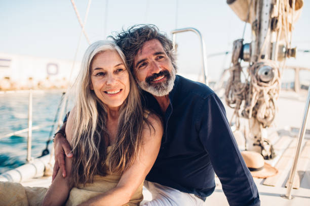 istock Senior couple enjoying their romantic sailing vacation 1324123109
