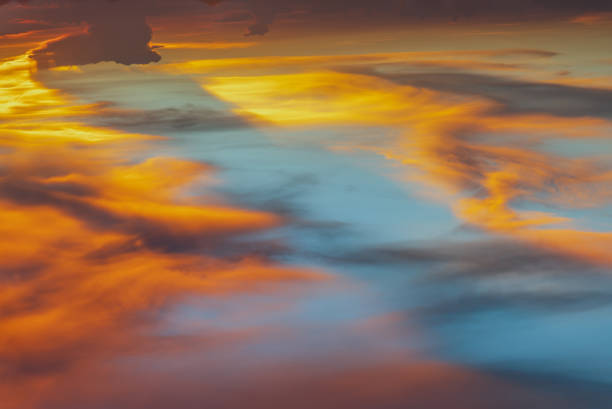 istock Beautiful sunset sky above clouds with dramatic light, Beautiful blazing sunset landscape. 1324124572