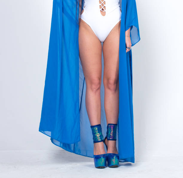 istock Long lags of woman posing in bathrobe 1324124596