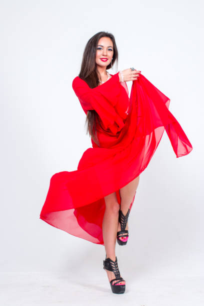 istock Pretty woman posing in bathrobe 1324125765