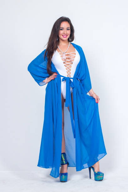 istock Pretty woman posing in bathrobe 1324126695