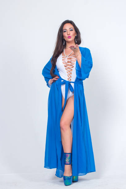 istock Pretty woman posing in bathrobe 1324126697