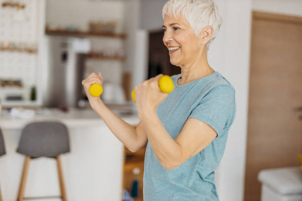 istock Senior woman exercising 1324128193