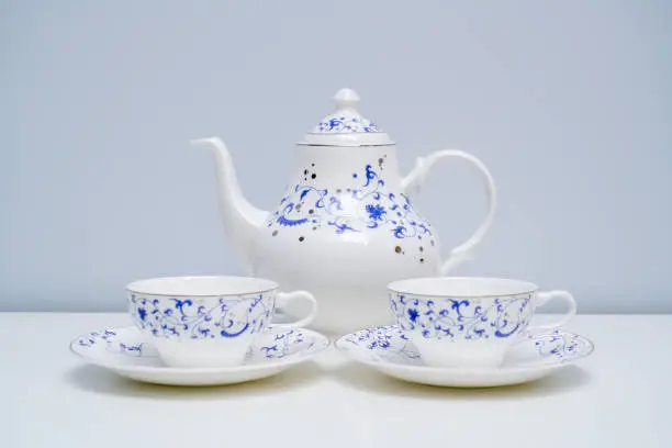 Teapots and cups for English afternoon tea