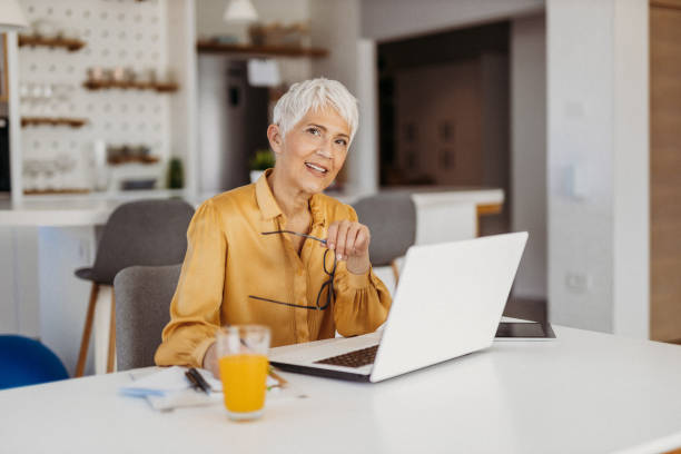 istock Senior woman working 1324129074