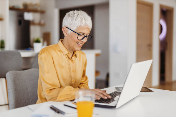 istock Senior woman working 1324129119