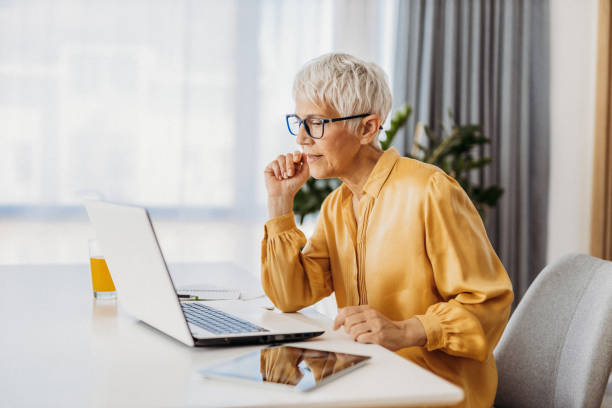 istock Senior woman working 1324129389
